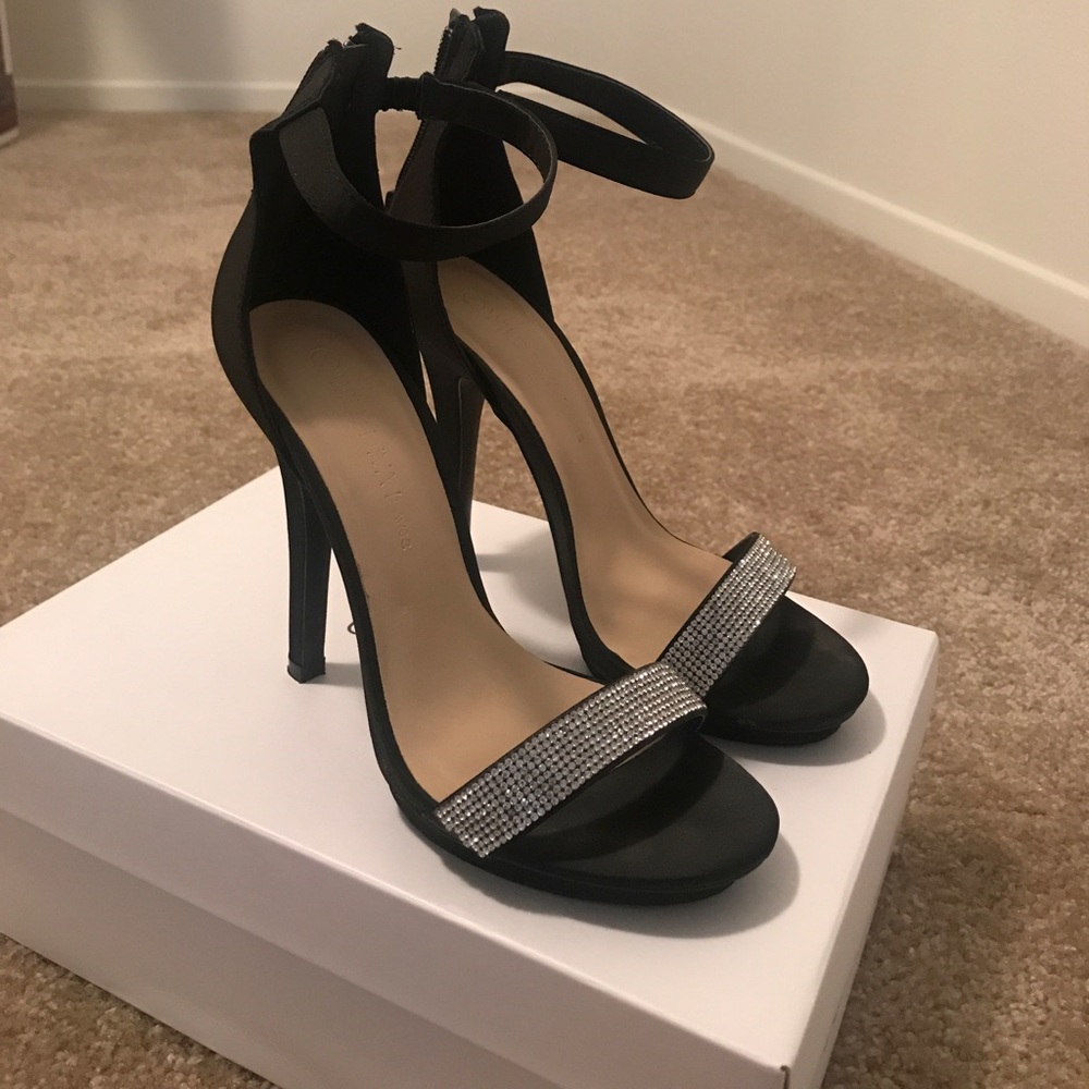 Bedazzled strappy heels. Worn once. Size 7